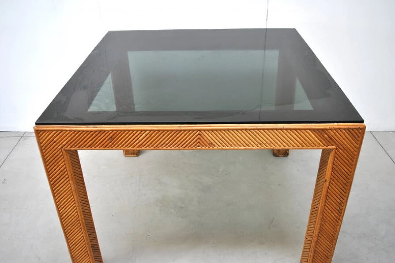 Table in wicker and smoked glass, 70s 1228452