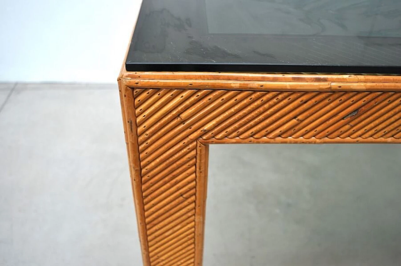 Table in wicker and smoked glass, 70s 1228453