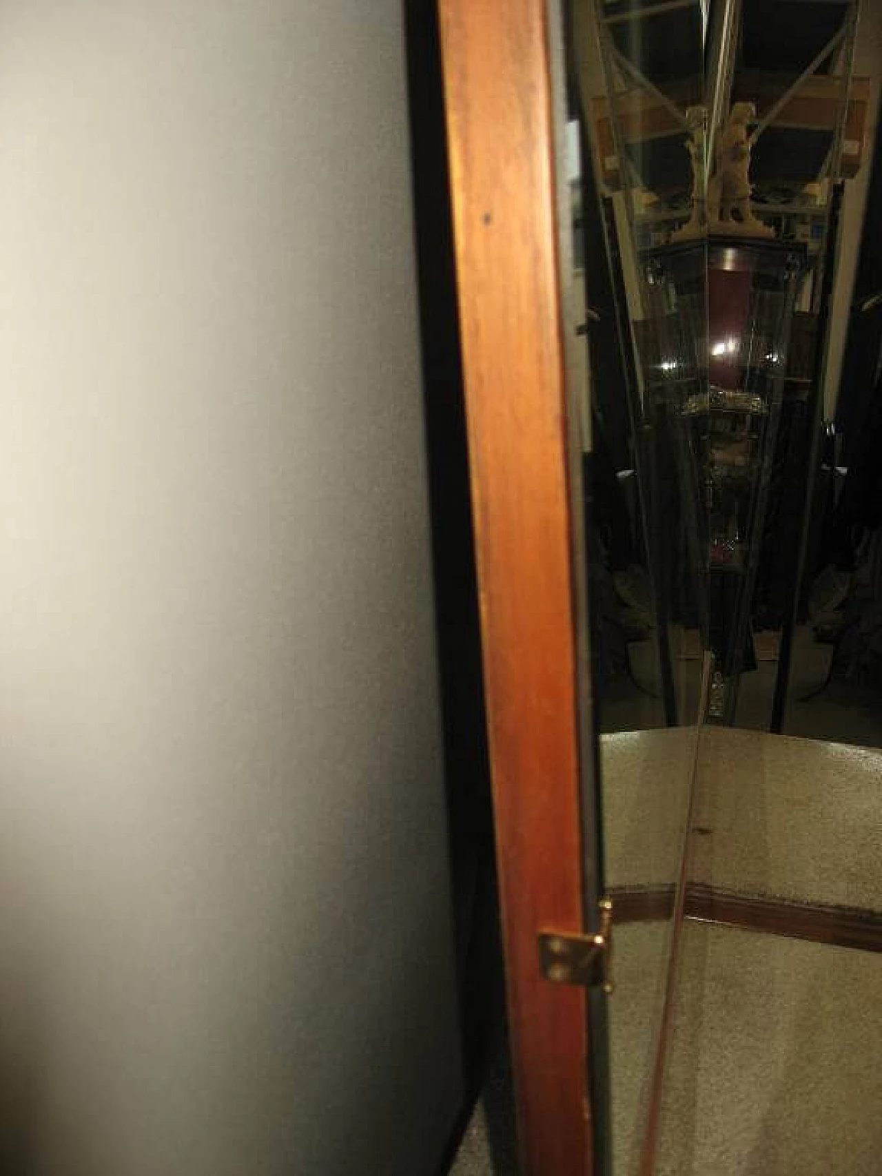 Specchiera sagomata con base in legno, anni '60 1229809