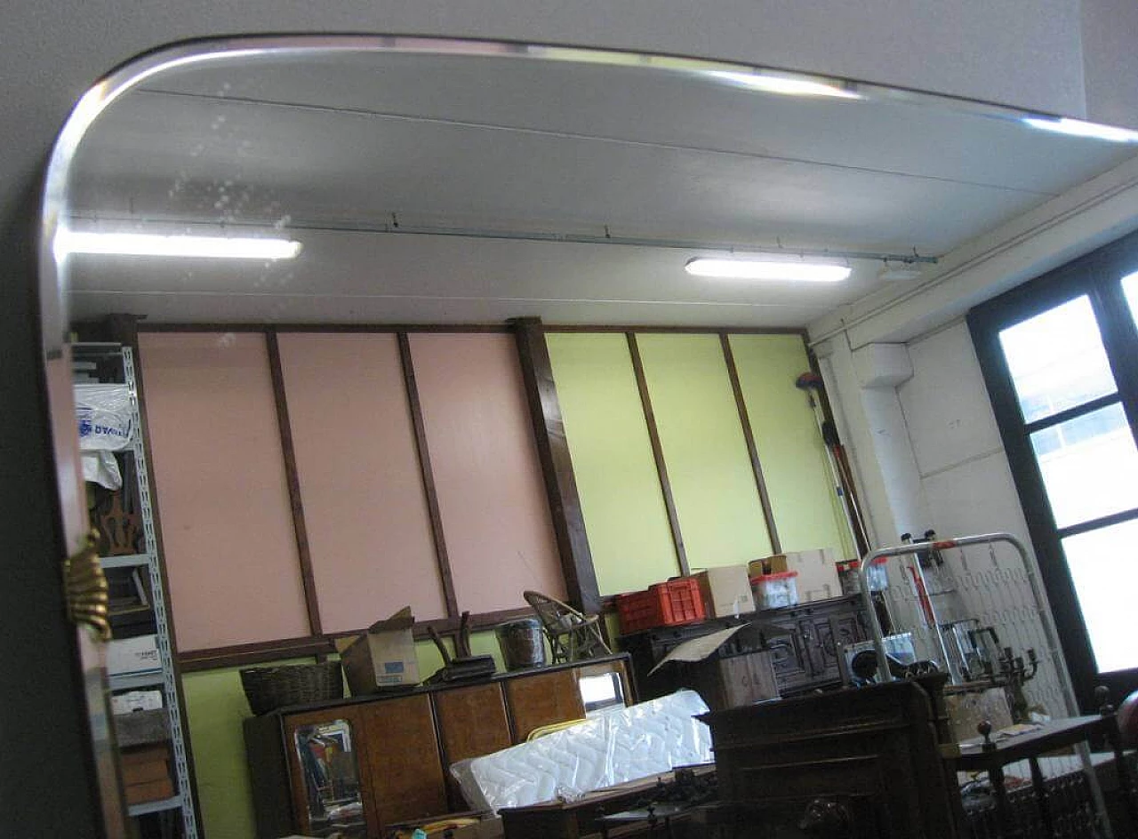 Specchiera sagomata con base in legno, anni '60 1229812