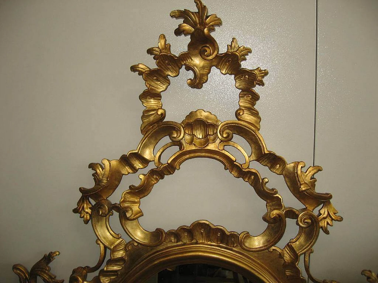 Mirror in Barocchetto style in gilded wood, 40s 1230059
