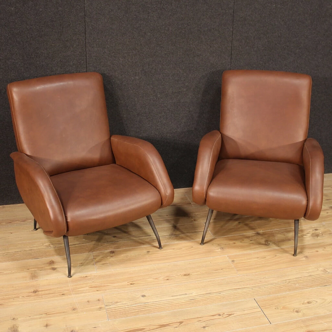 Pair of armchairs in skai with metal legs, 70s 1230596