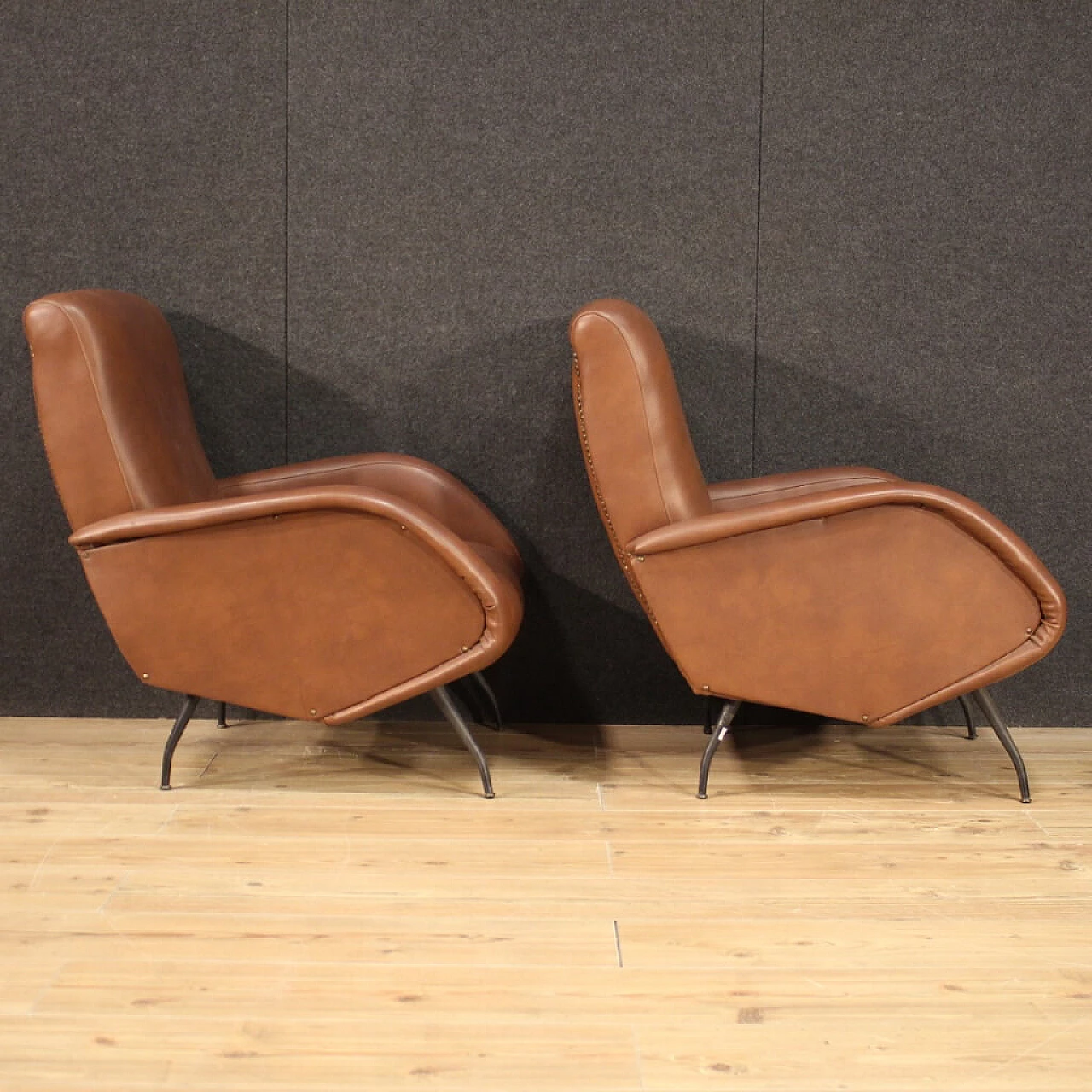 Pair of armchairs in skai with metal legs, 70s 1230600