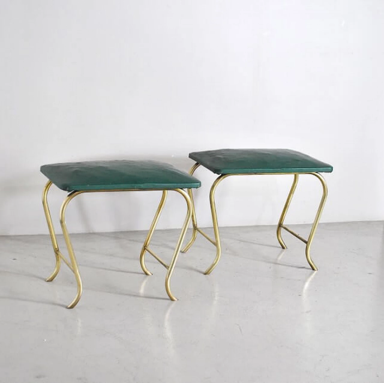 Pair of ottomans with tubular brass frame and green vinyl seats, 60s 1233913