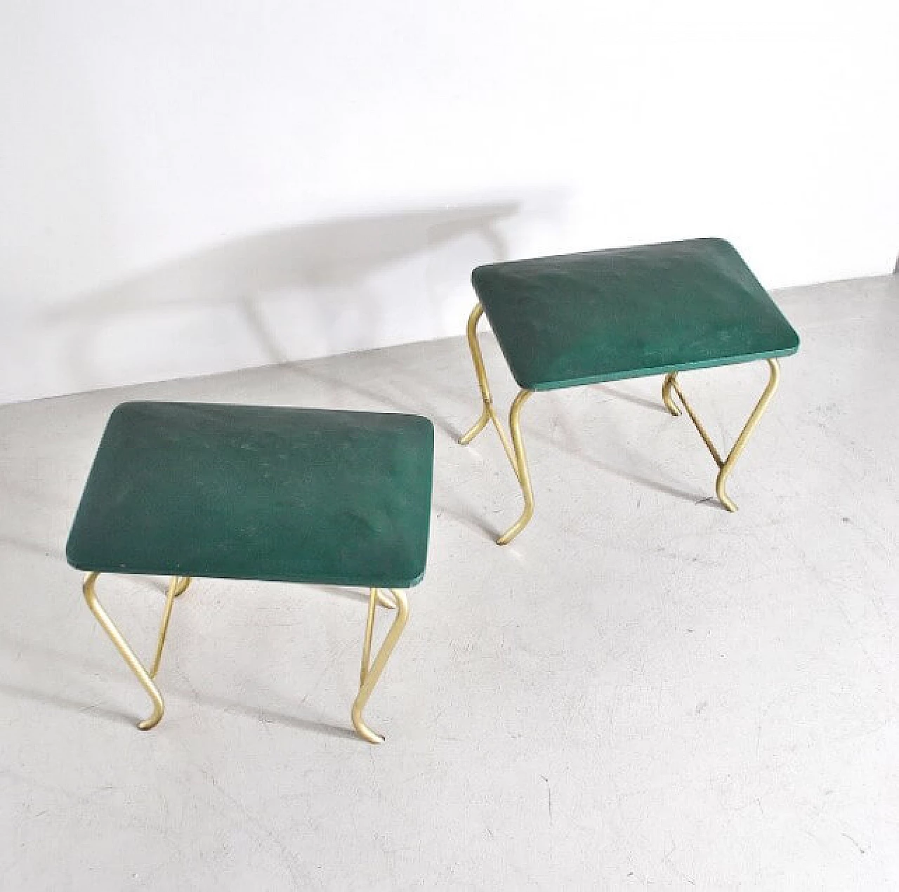 Pair of ottomans with tubular brass frame and green vinyl seats, 60s 1233915