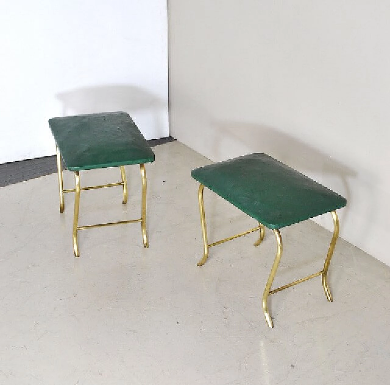 Pair of ottomans with tubular brass frame and green vinyl seats, 60s 1233916
