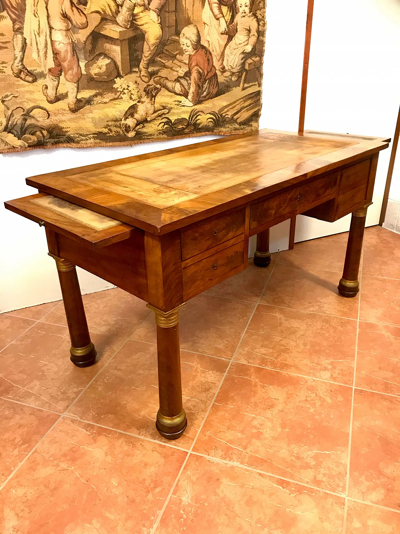 Empire writing table with columns and bronze gilded mahogany feather, top and drawers covered in leather, original early 19th century 1234723