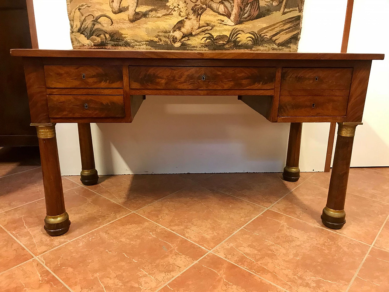 Empire writing table with columns and bronze gilded mahogany feather, top and drawers covered in leather, original early 19th century 1234724