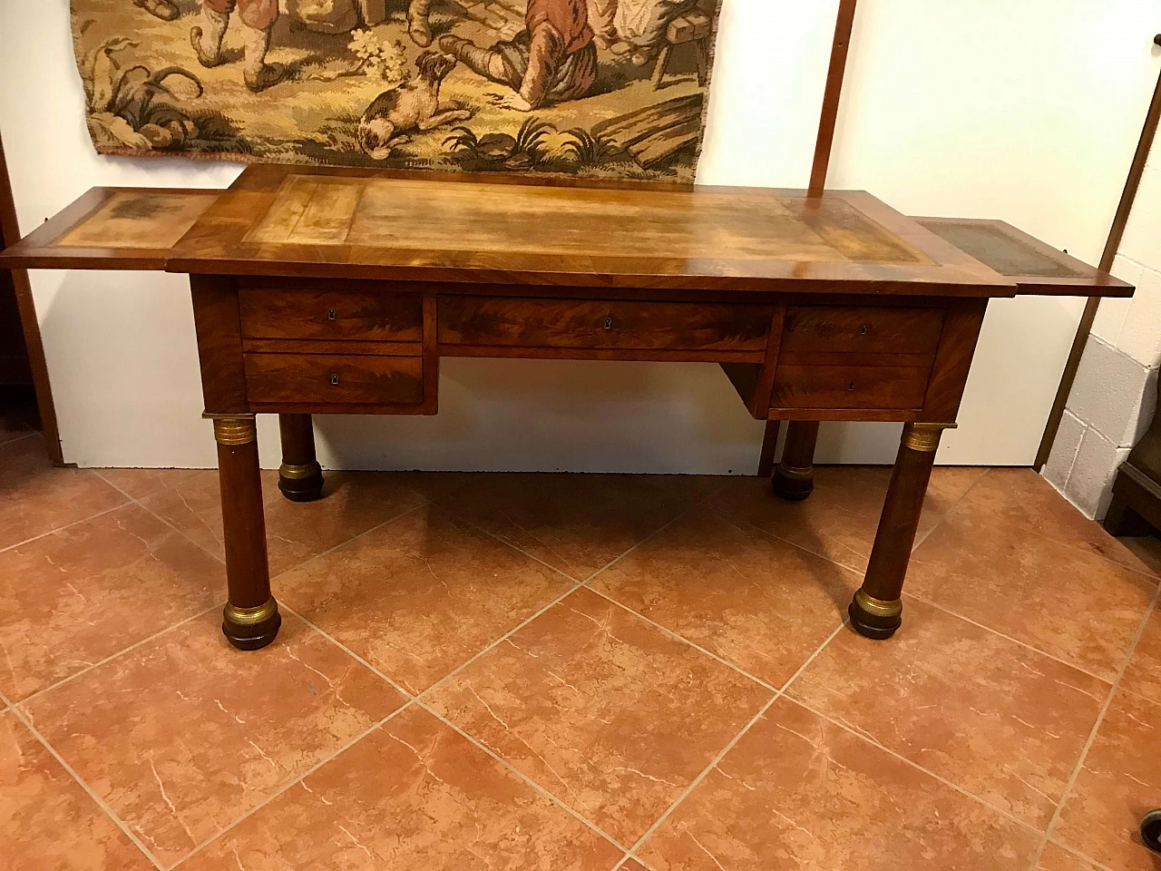 Empire writing table with columns and bronze gilded mahogany feather, top and drawers covered in leather, original early 19th century 1234725