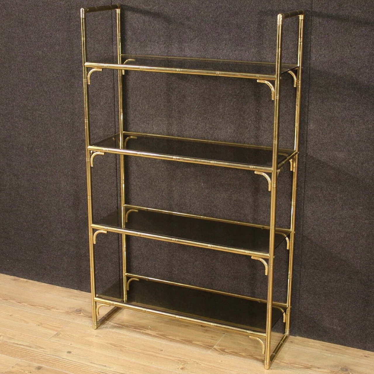 Italian gilt metal bookcase with glass shelves, 70s 1250565