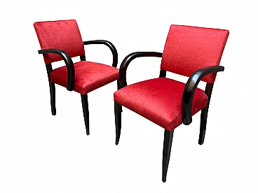 8 French armchairs in red velvet and ebonized wood, 1950s