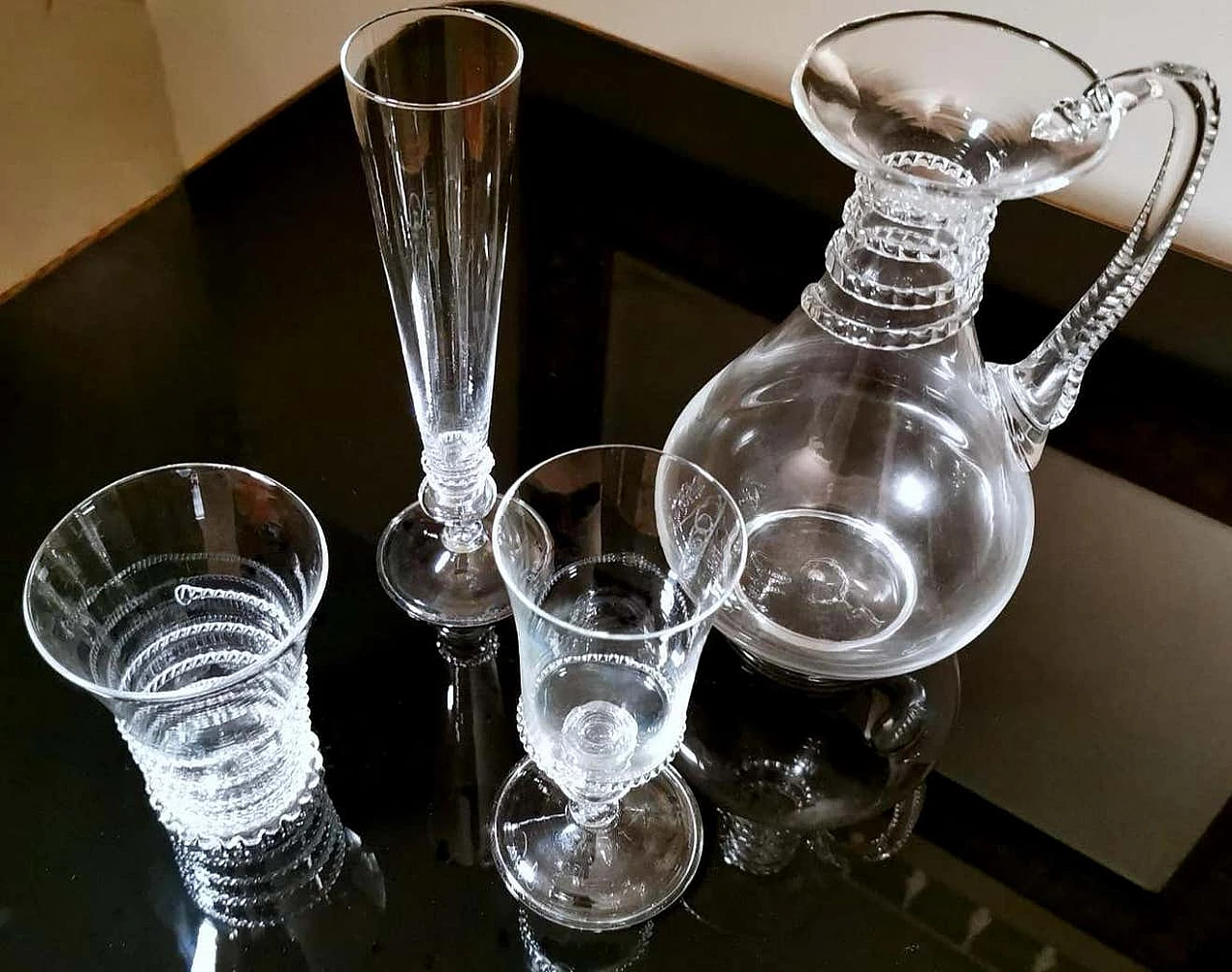 Service of 36 glasses and pitcher in blown Murano glass with decorations, 50s 1254420
