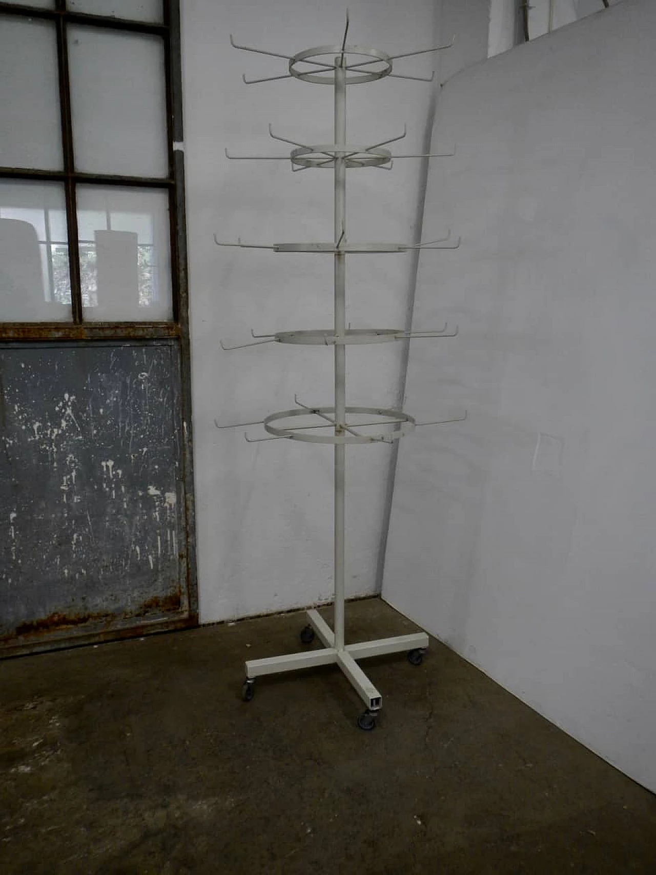 Metal display stand with wheels, 70s 1254825
