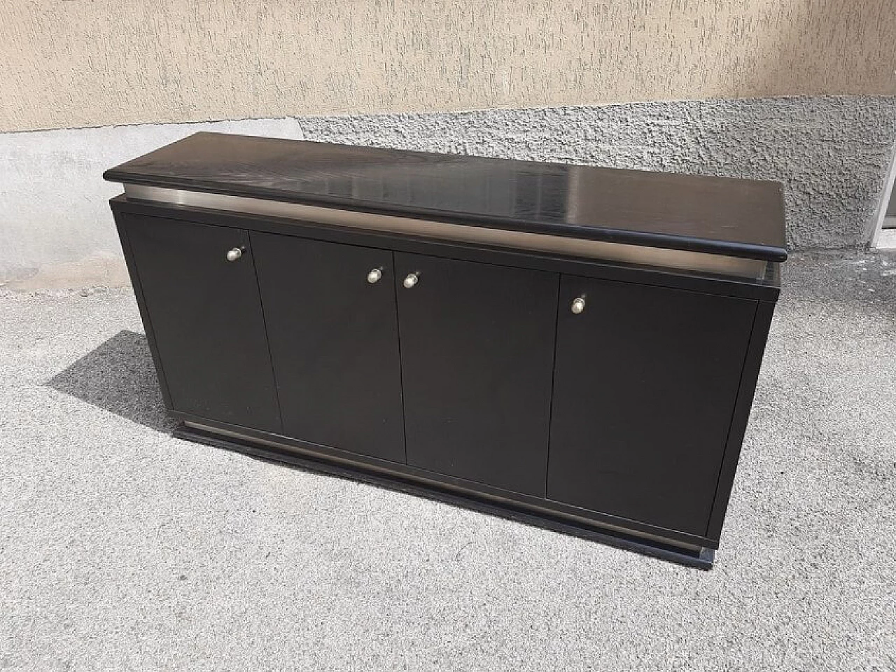 Pair of chest of drawers in ebonized wood and aluminum, 70s 1263011