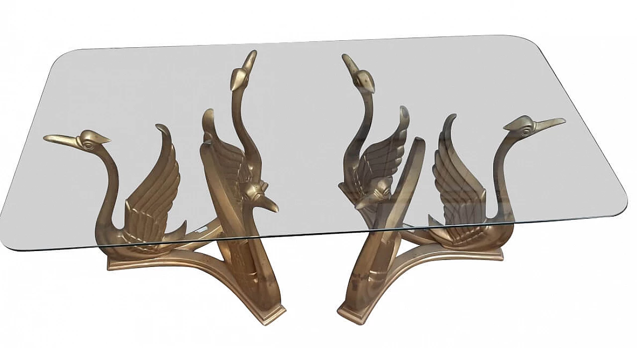 Coffee table with glass top and swan-shaped legs in brass, 70s 1264123