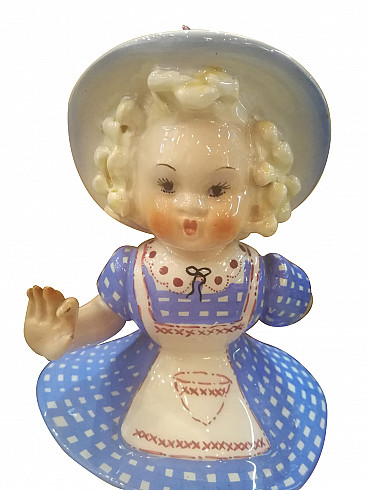 Sculpture of a little girl with hat in porcelain, 20s