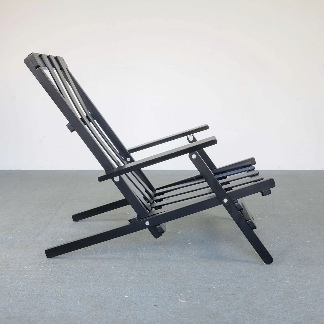 Deck chair by Dino Gavina in black lacquered wood, 70s 1270248