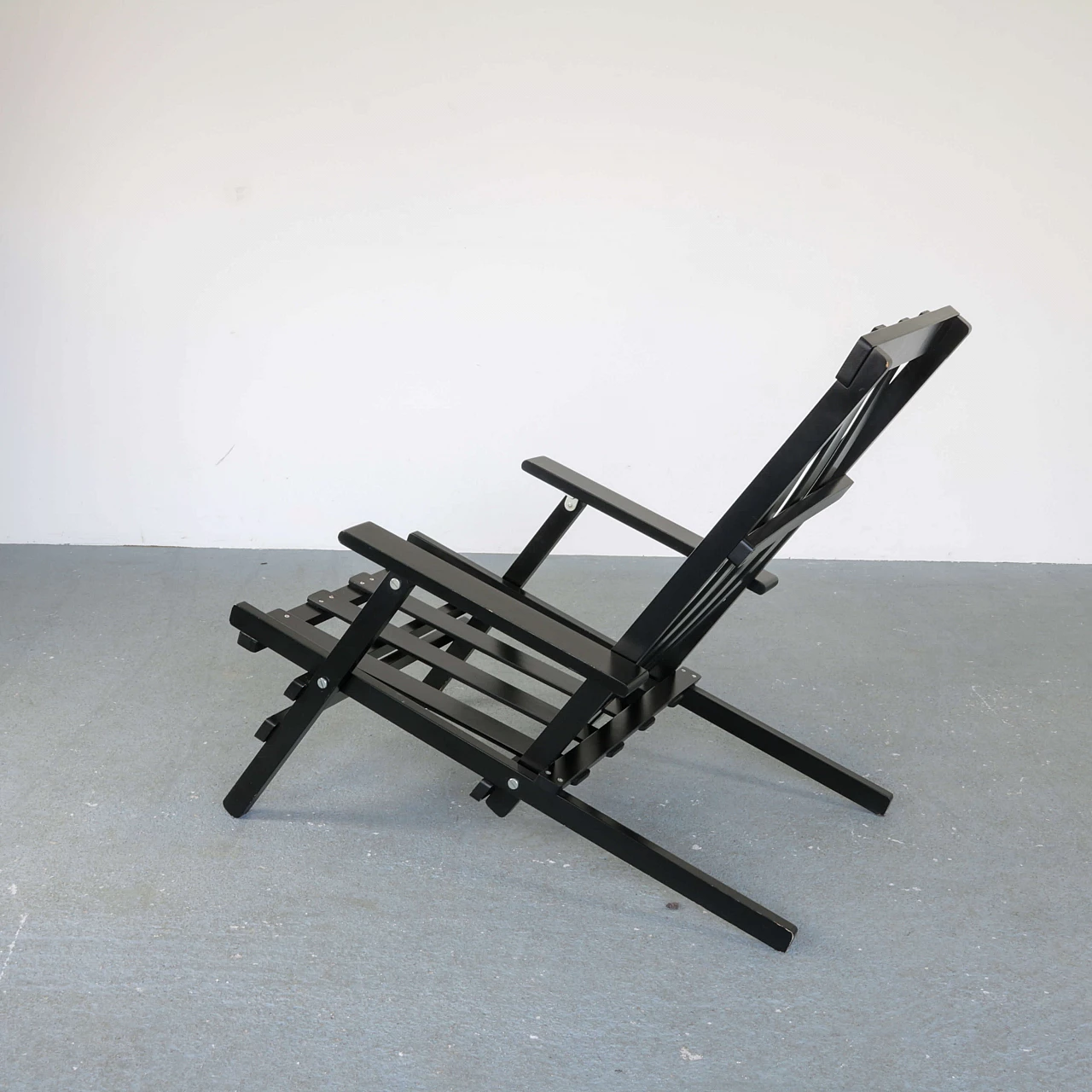 Deck chair by Dino Gavina in black lacquered wood, 70s 1270253