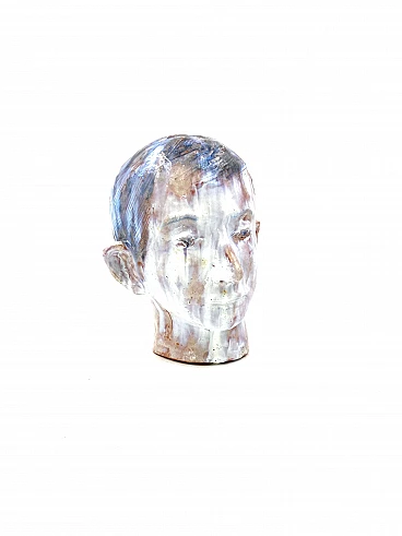 Glazed terracotta child's head, France, 1958