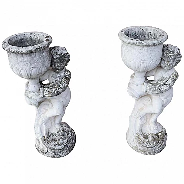 Pair of outdoor grit statues with vase holder, early 20th century