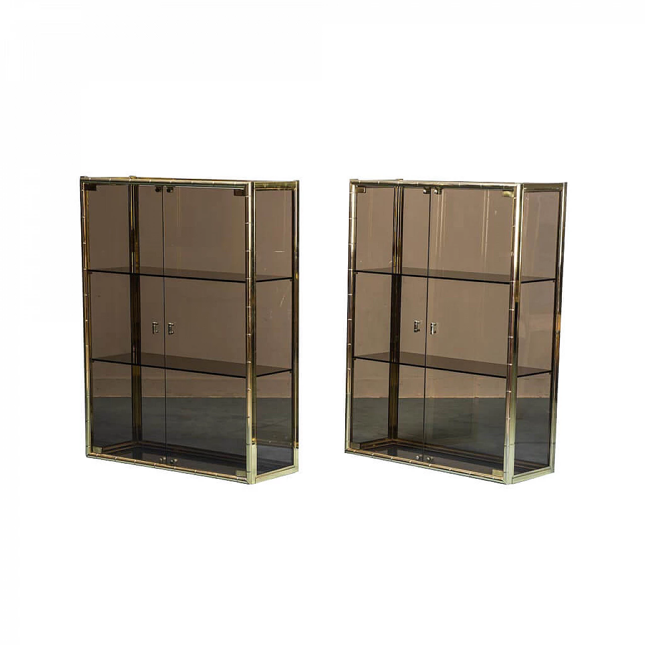 Gilded metal and smoked glass showcase, 70s 1279575