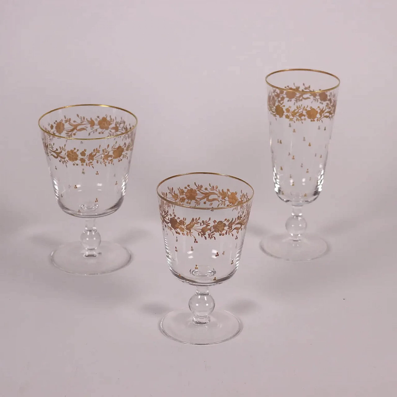 Servizio di bicchieri in cristallo molato e decoro in oro 1279900