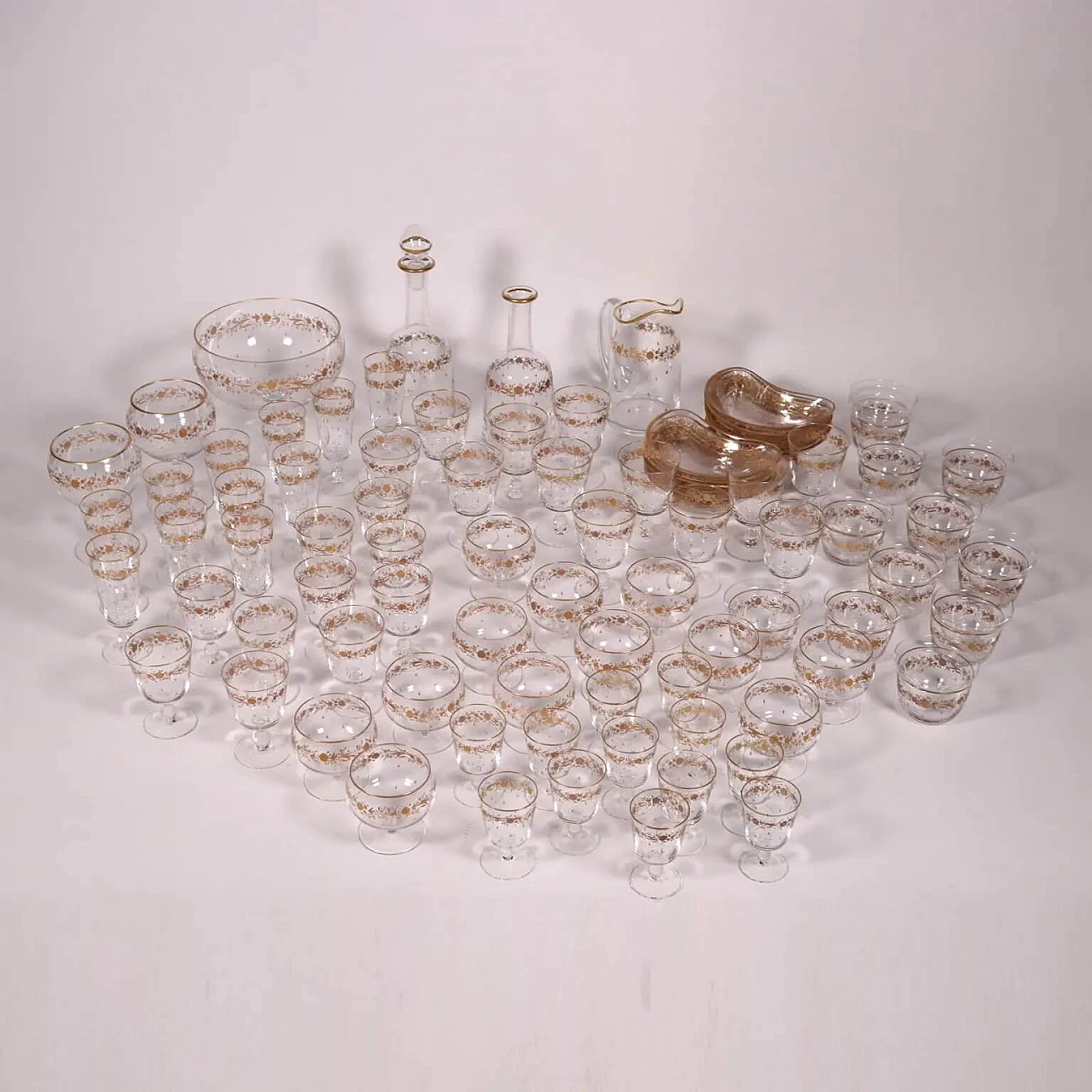 Servizio di bicchieri in cristallo molato e decoro in oro 1279904