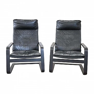 Pair of armchairs in black leather, 70s