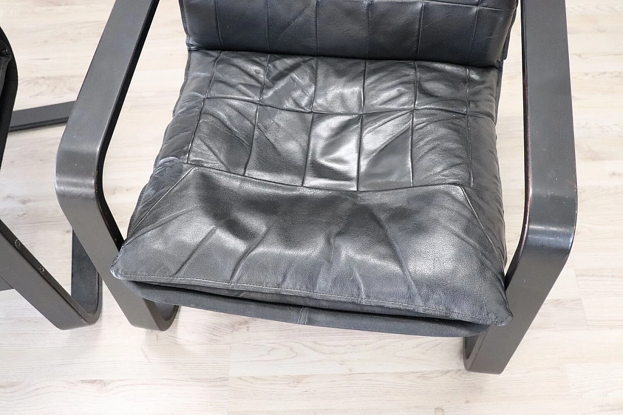 Pair of armchairs in black leather, 70s 1280643
