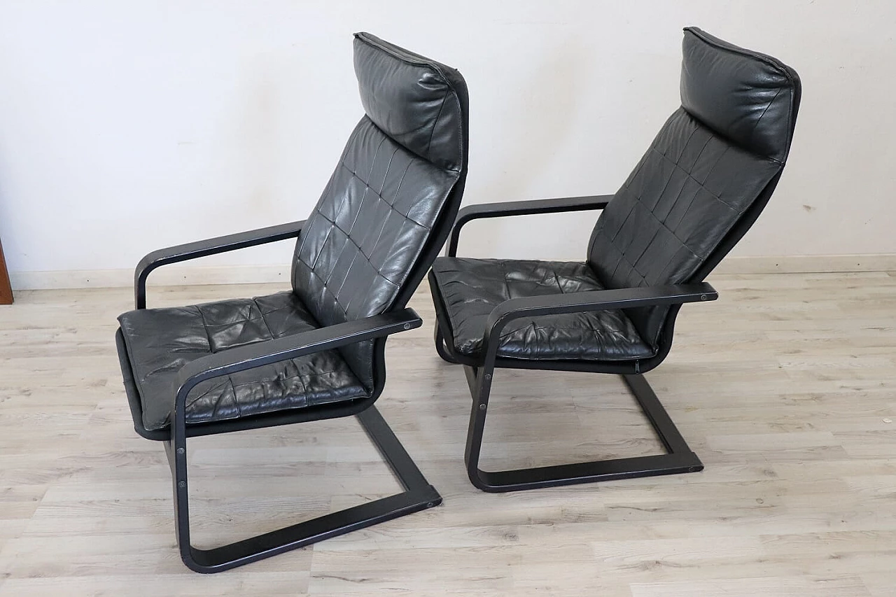 Pair of armchairs in black leather, 70s 1280647