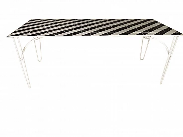 Iron table with black and white ceramic tile top