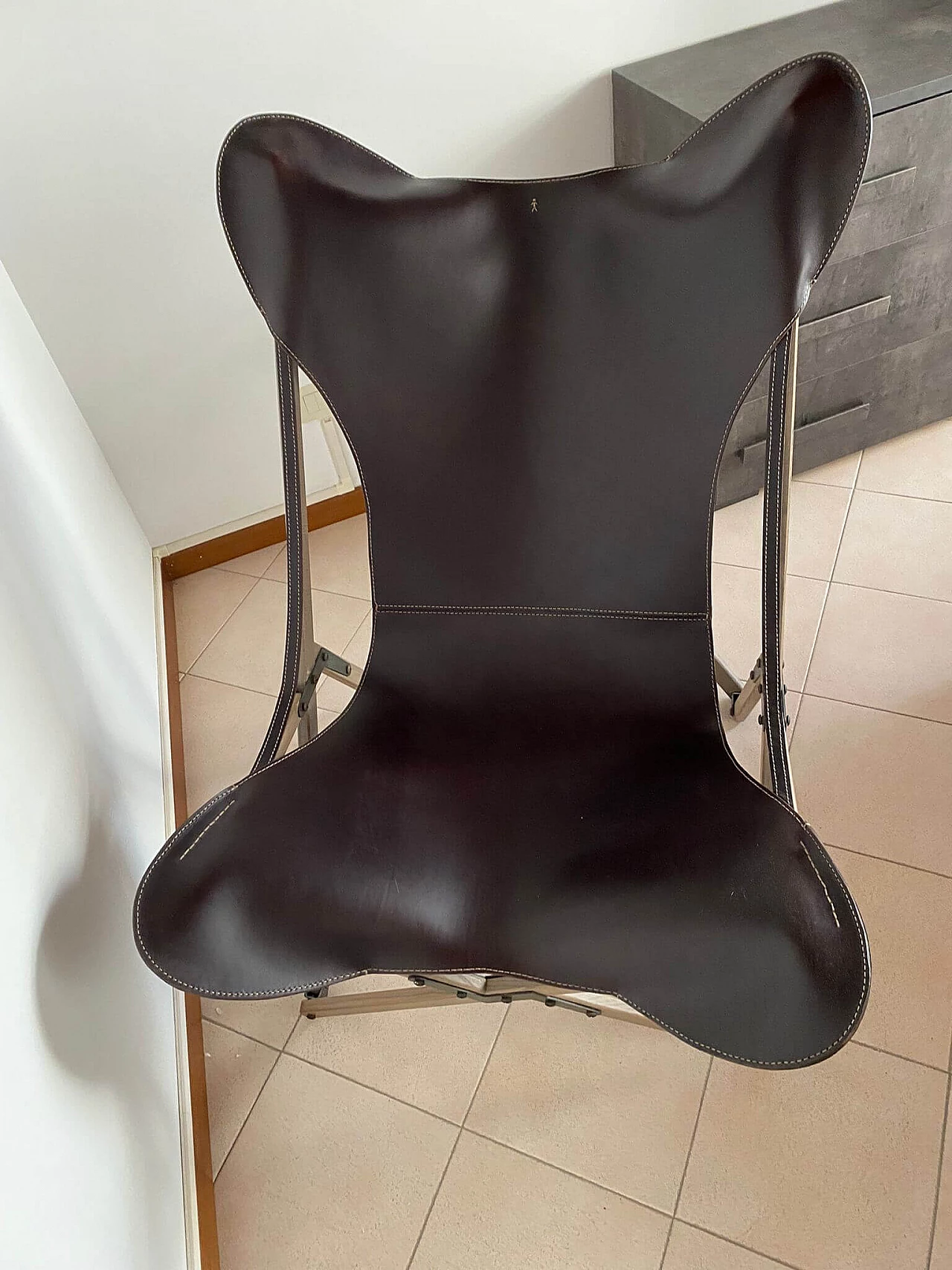 Poltrona tripolina Milady in cuoio di Henry Beguelin 1306884