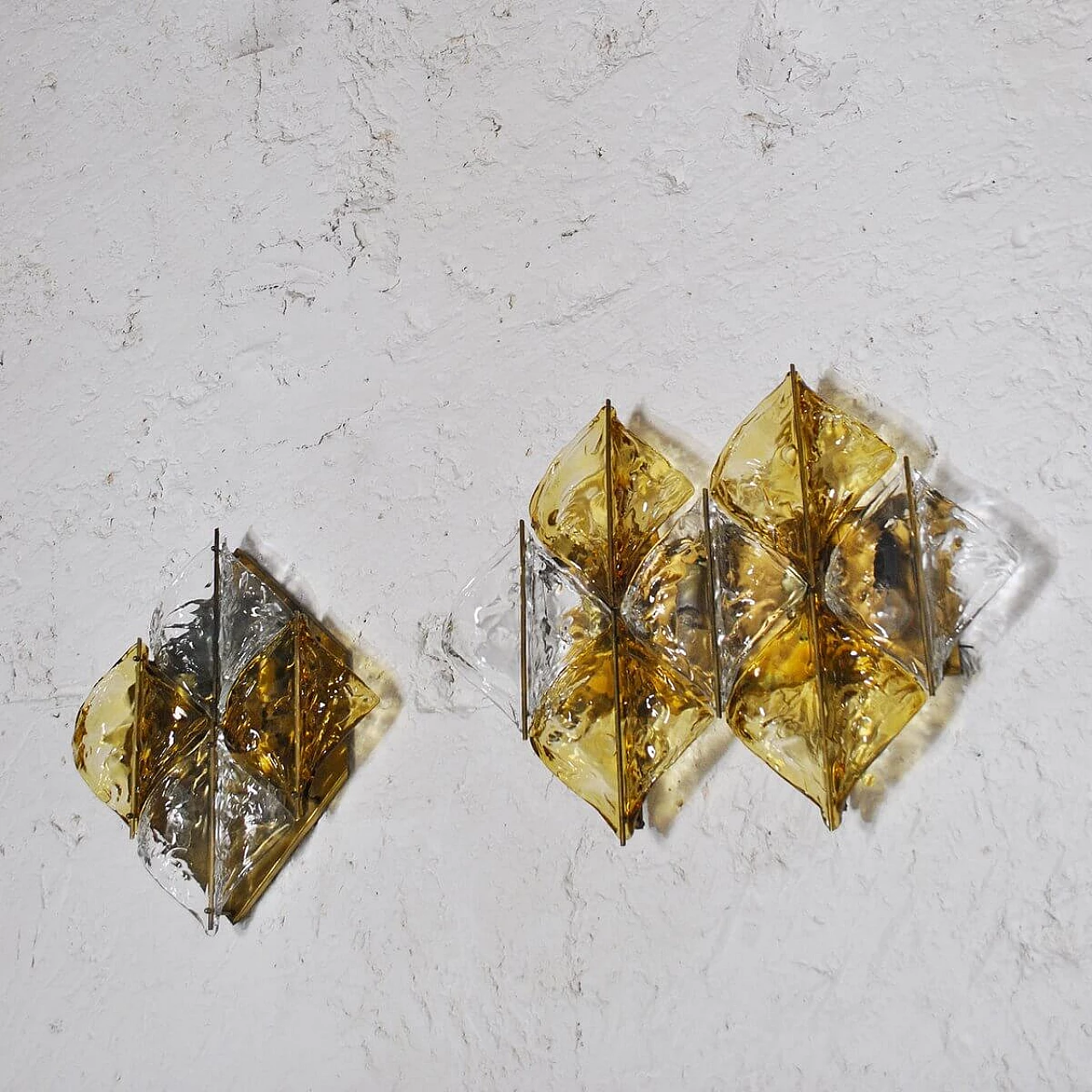 Pair of wall lamps in amber Murano glass and brass by Mazzega, 60s 1310296