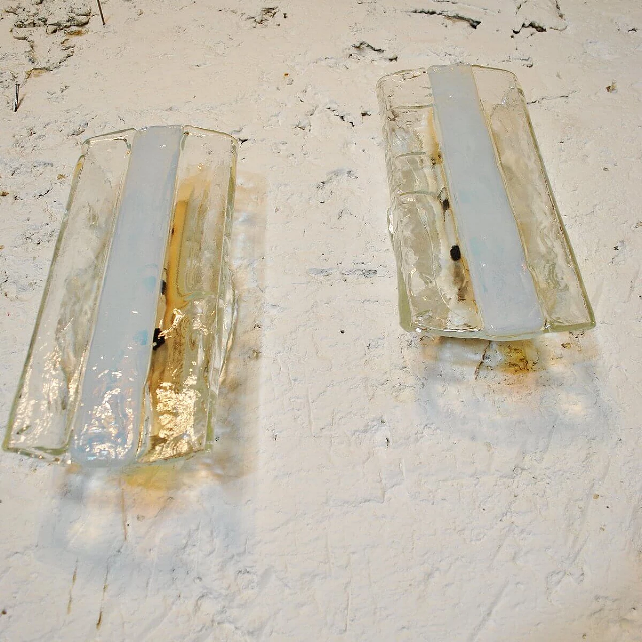 Pair of wall lamps in transparent rough Murano glass by Mazzega, 60s 1311050