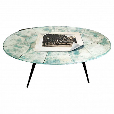 Oval coffee table with top in parchment covered wood and brass by Aldo Tura, 50s
