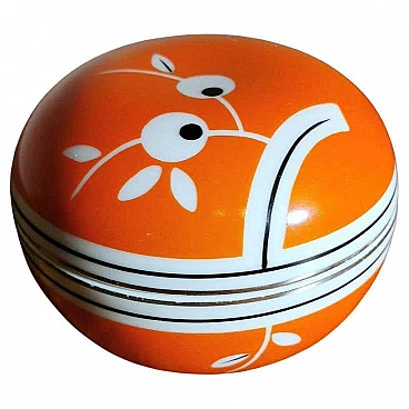 Round box in orange and white porcelain, 40s