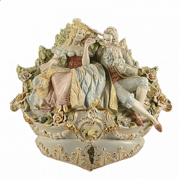 Sculptural group depicting two lovers in 18th century ceramic costumes