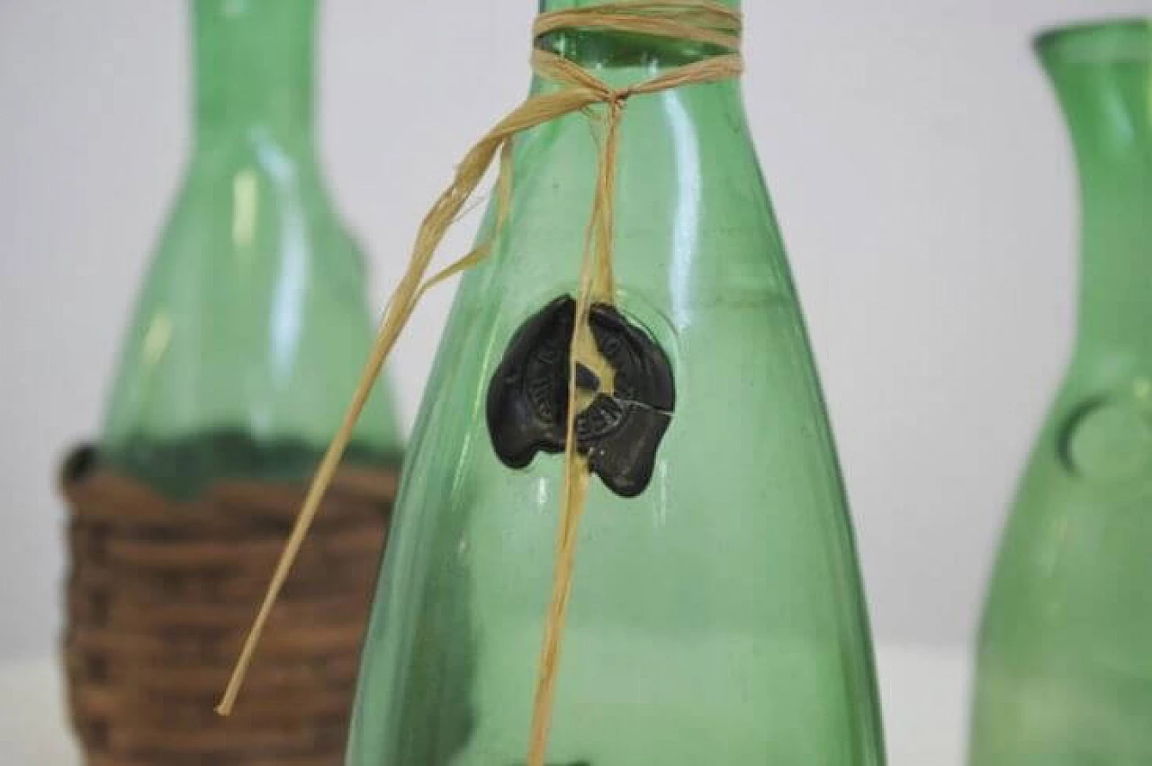 Group of 4 green glass decanters, 1950s 1371815