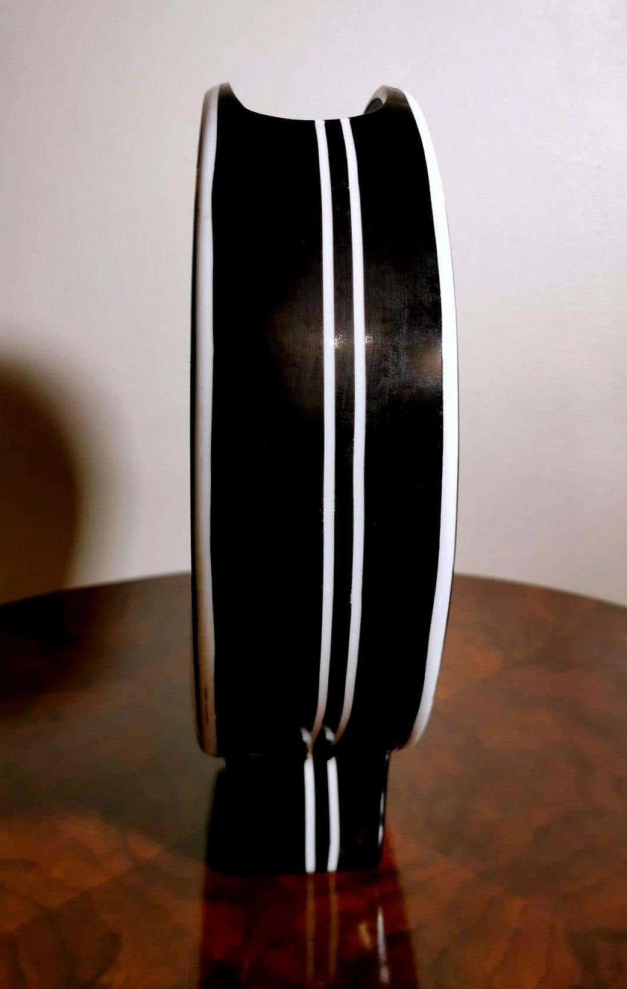 French circular vase in black and gold porcelain 1374885