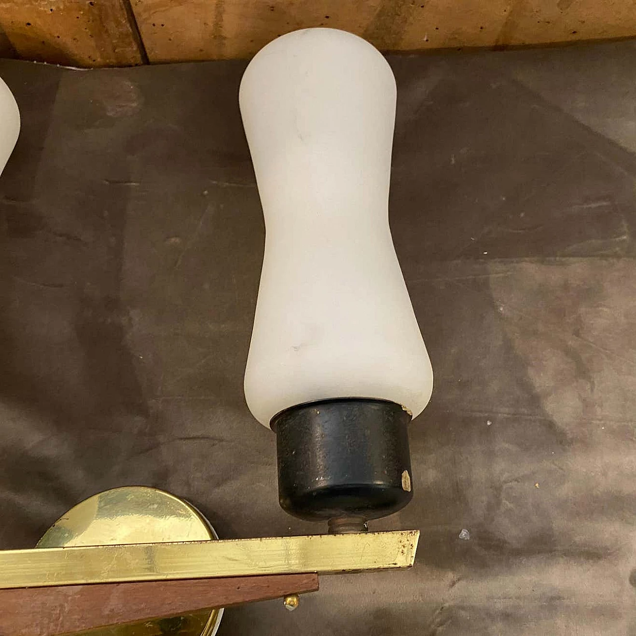 A pair of brass, teak and glass wall lamps in the Stilnovo style, 1950s 1377572