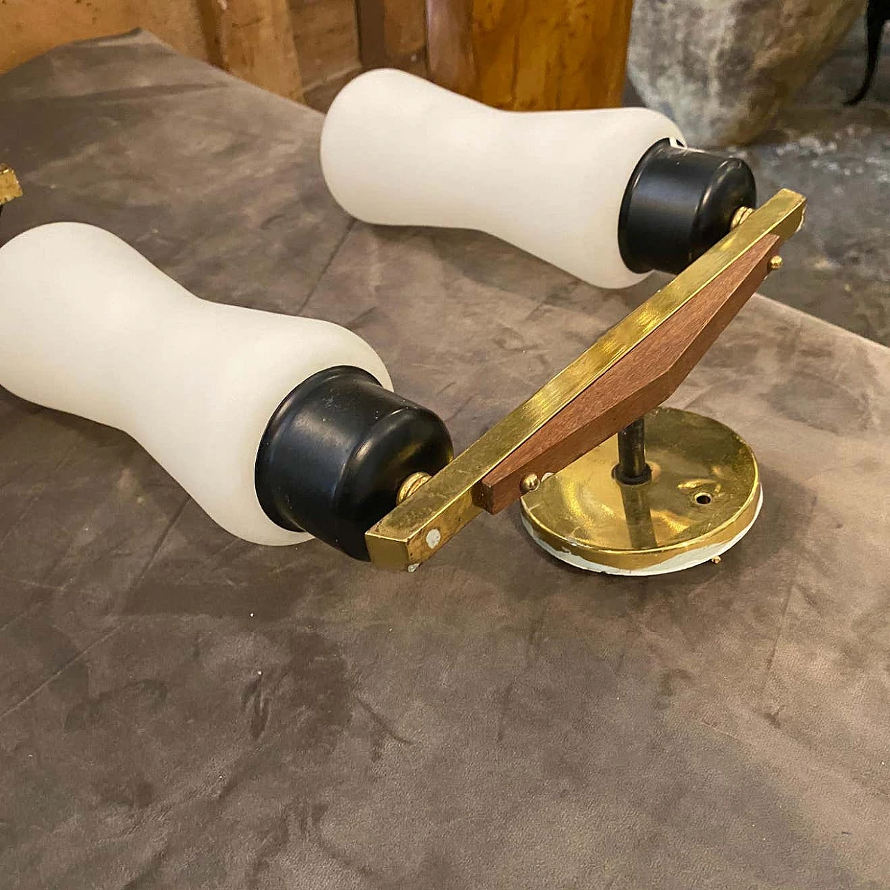 A pair of brass, teak and glass wall lamps in the Stilnovo style, 1950s 1377573