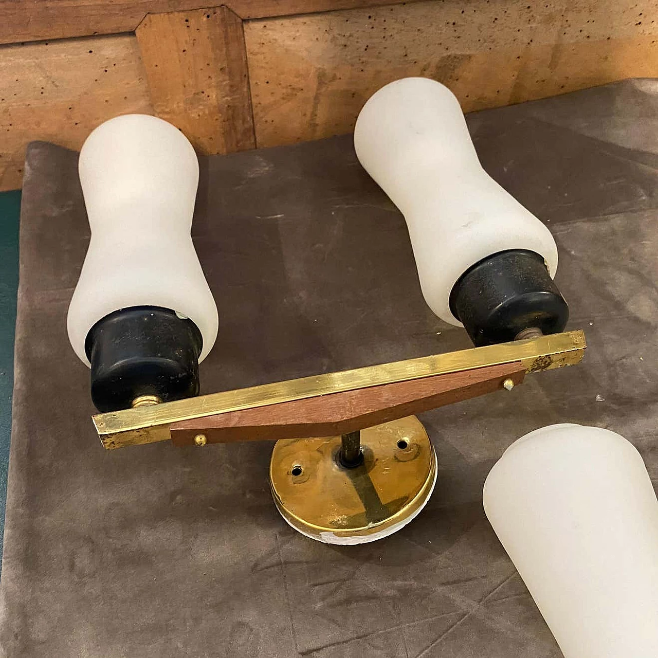 A pair of brass, teak and glass wall lamps in the Stilnovo style, 1950s 1377579