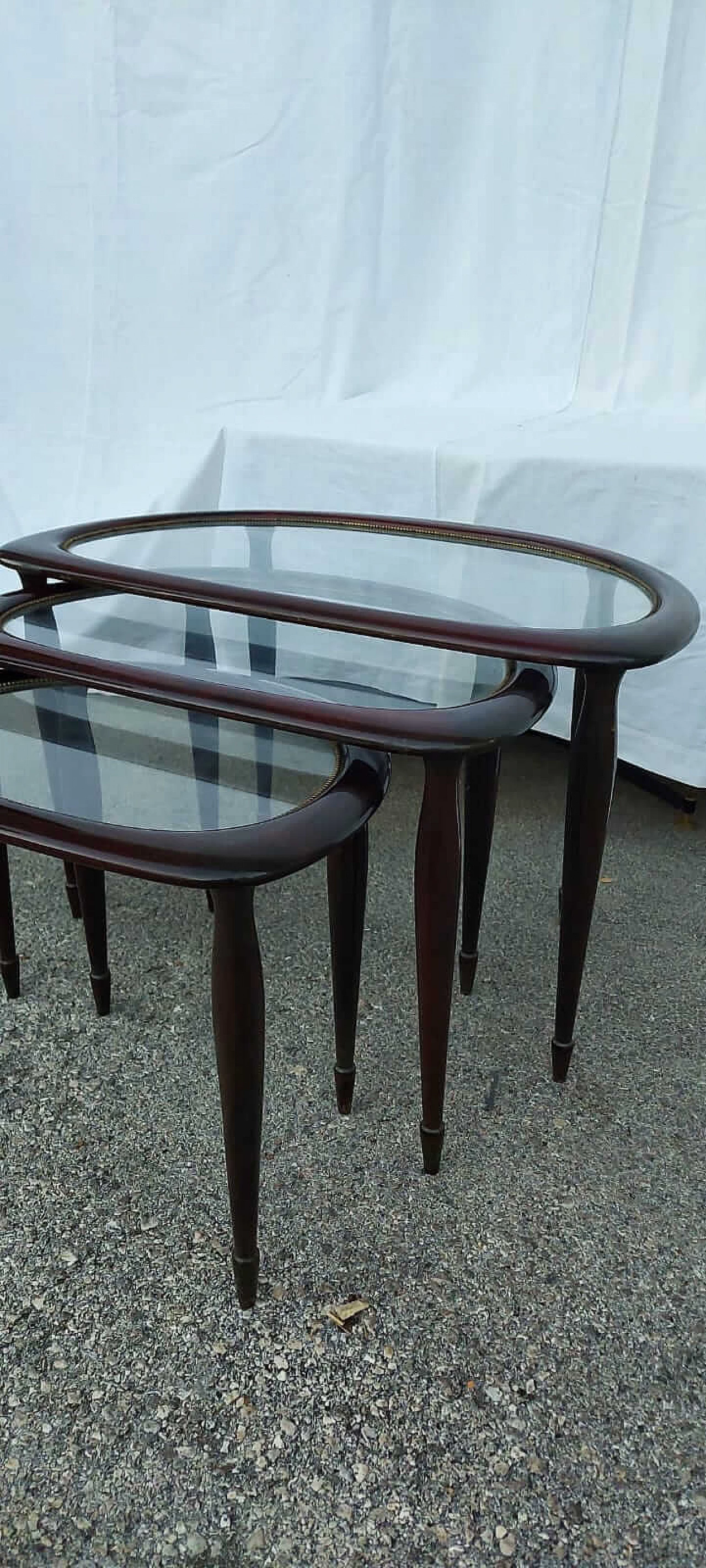 Small nesting tables in wood with glass top, 1950s 1377694