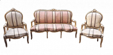 Sofa and two armchairs in gilded wood, 19th century