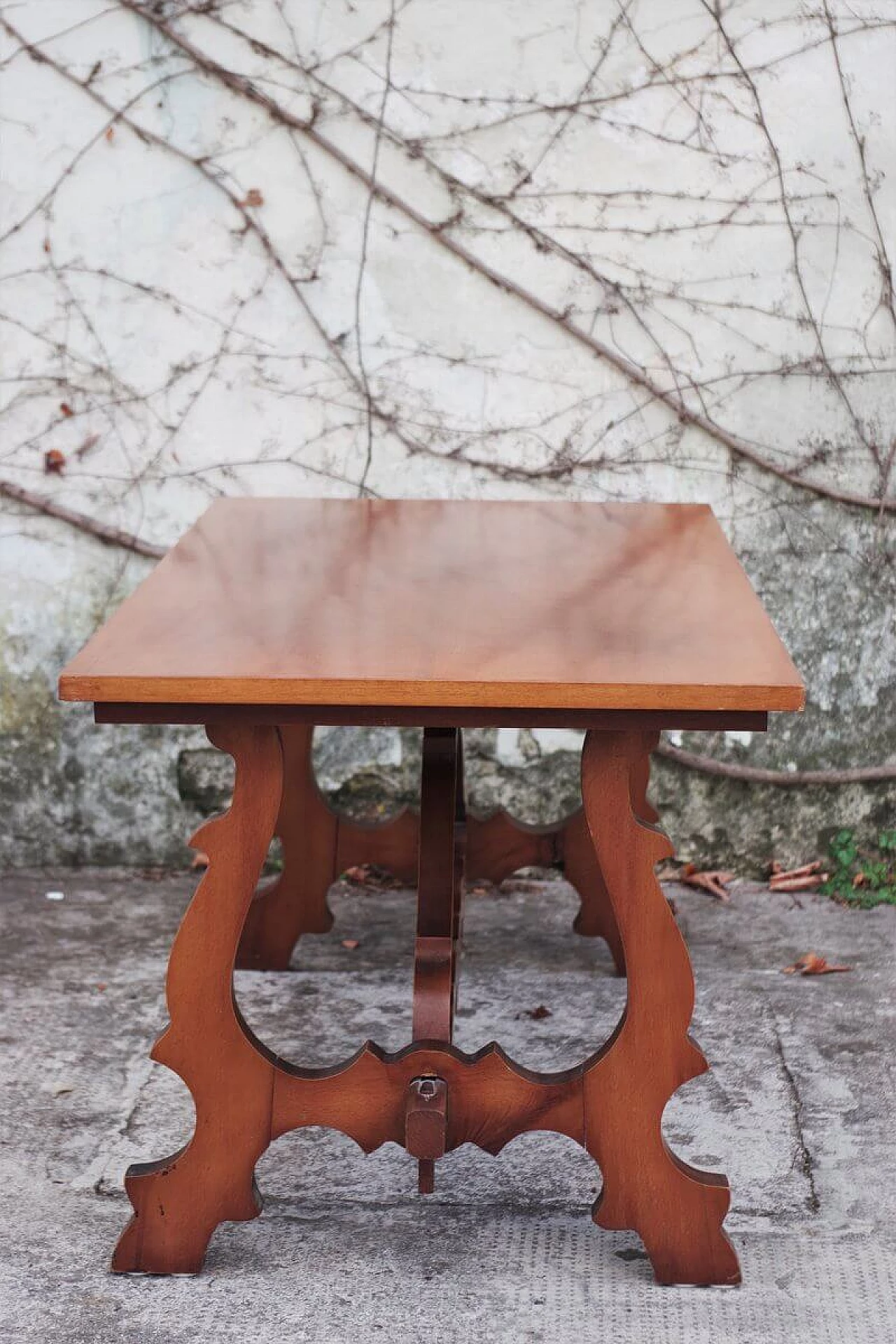 Wooden coffee table with carved base, 1960s 1379650
