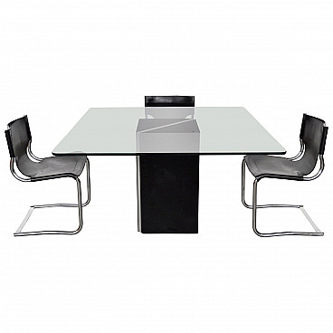 Table with glass top and 4 chairs in tubular metal and leather, 70s