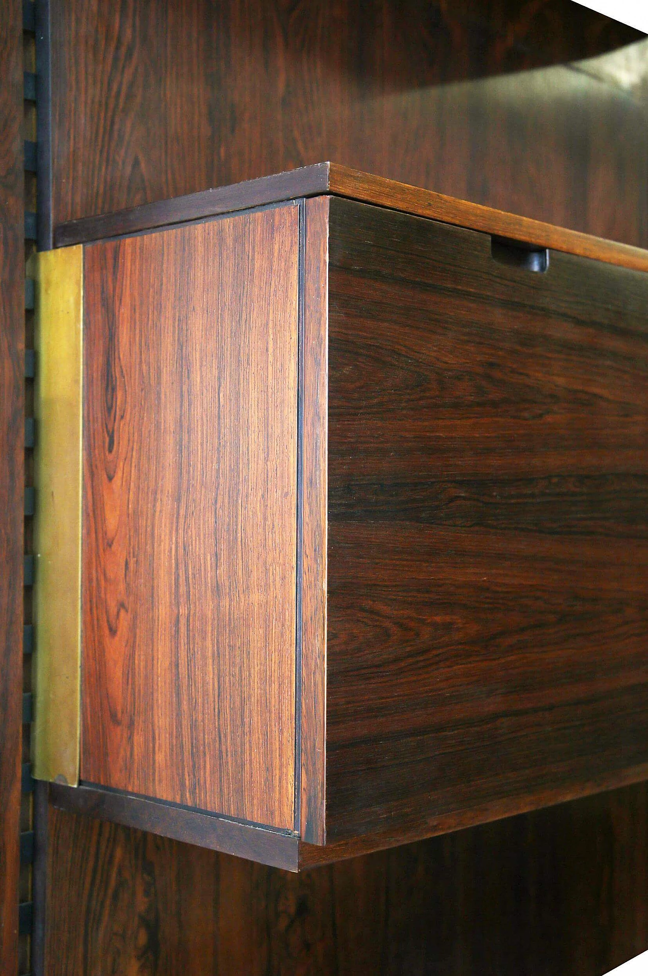 Wall-mounted wooden and brass bookcase by Raffaella Crespi for Mobilia, 1960s 1386547