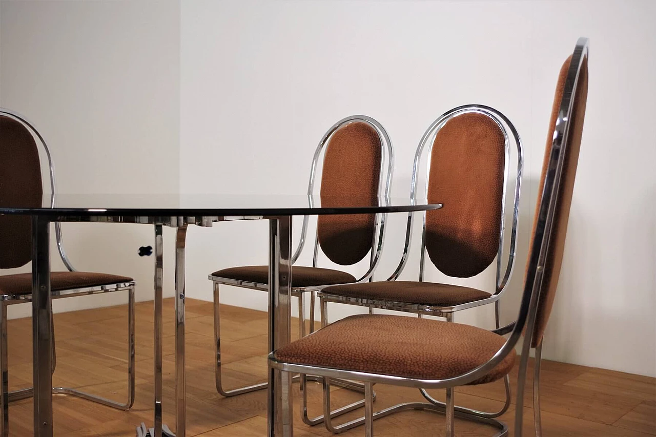Table in metal and smoked glass top with 6 chairs in metal and fabric by Alessandro Albrizzi, 70s 1394725