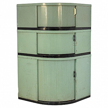 Green industrial-style corner cabinet, 1930s