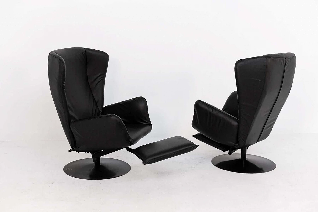 Pair of black leather armchairs with footrest cushion, 1970s 1405533